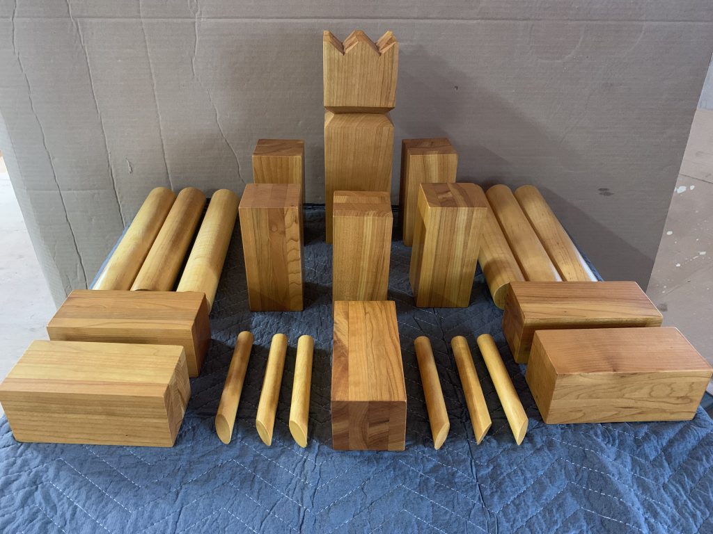 Our handmade Kubb gaming set.